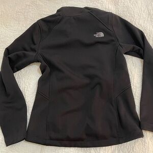 black corporate north face fitted zipper jacket